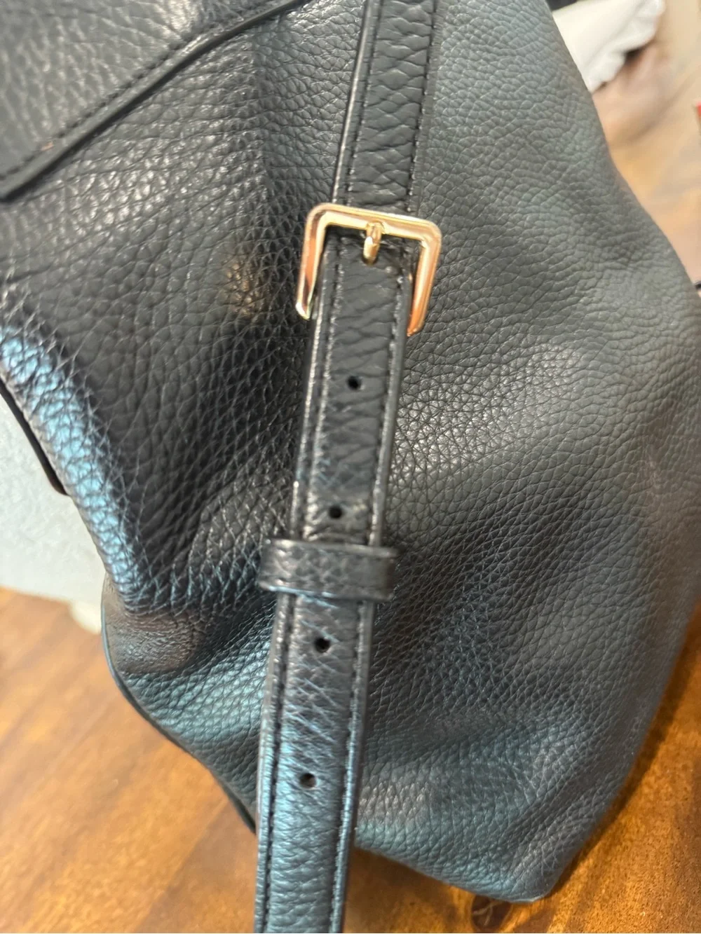 Tory Burch Black Pebbled Leather Tassel Drawstring Backpack